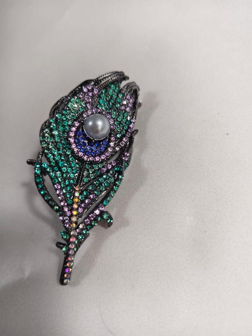 Imported premiun peacock feather brooch  multi stone work