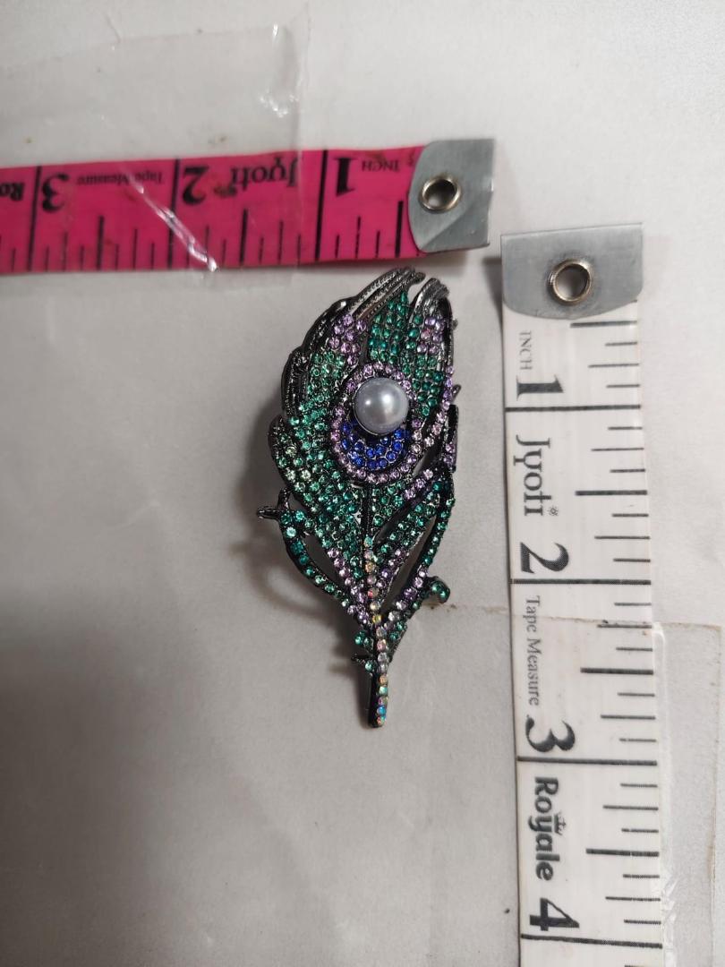 Imported premiun peacock feather brooch  multi stone work