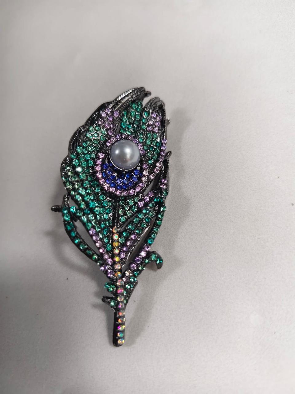 Imported premiun peacock feather brooch  multi stone work